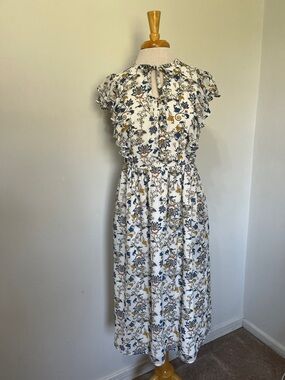 dip Fully Lined Floral White Blue and Gold Midi Dress with button and tie neck